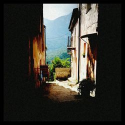 Narrow alley along houses