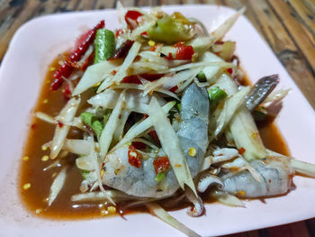 High angle view of chopped vegetables in plate