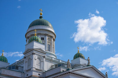 Low angle view of building against blue sky