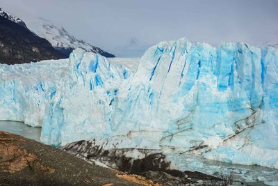 View of glacier against sky