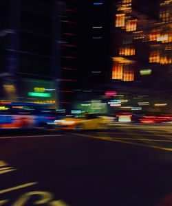 Traffic on city street at night