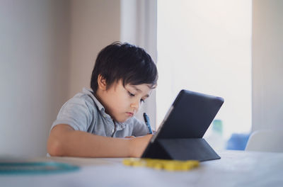 Boy studying at home