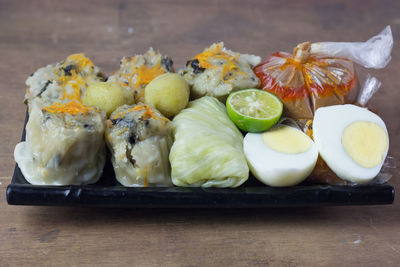Close-up of fruits in plate on table
