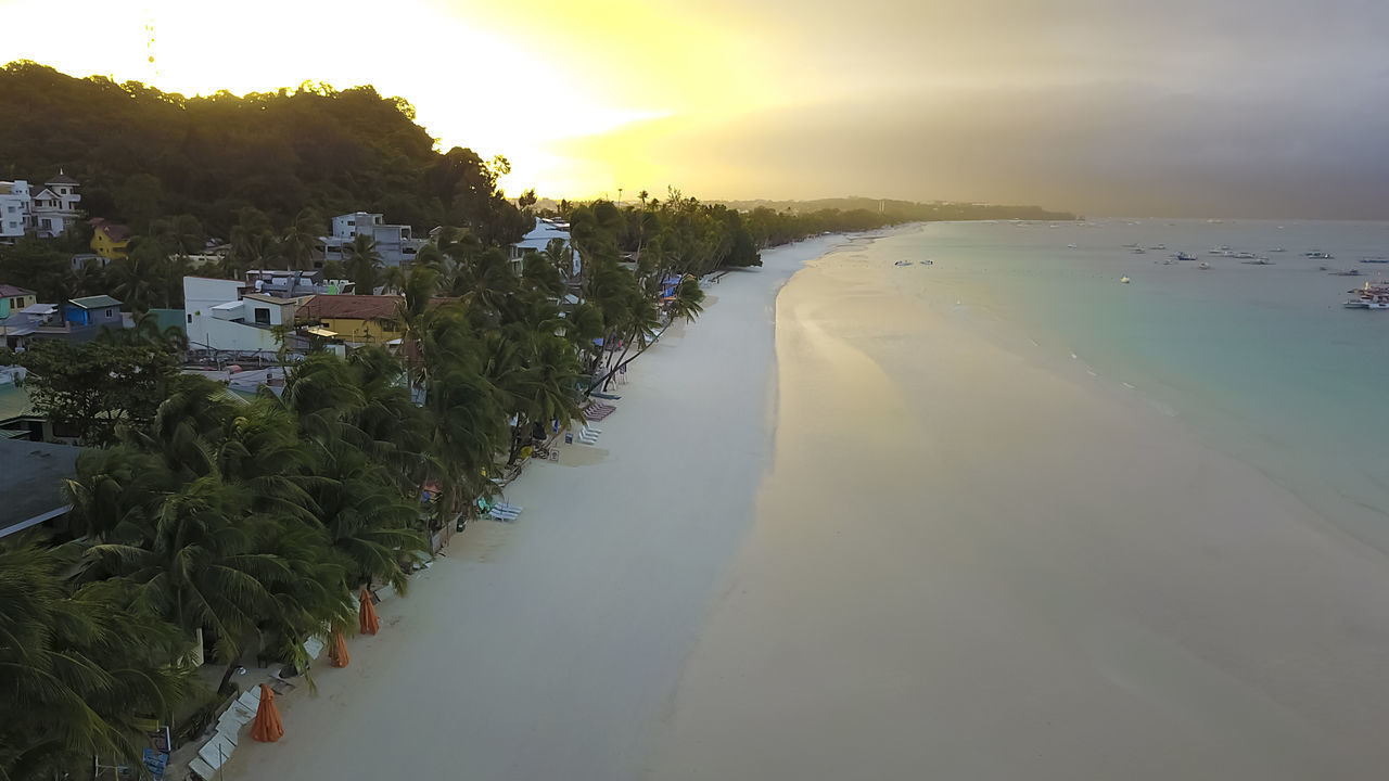 PANORAMIC VIEW OF SEA AGAINST SKY DURING SUNSET