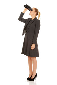 Full length of woman standing against white background