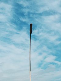 Low angle view of street light against sky