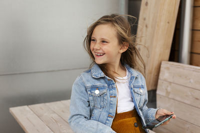 Smiling girl looking away