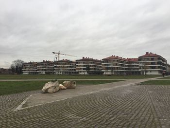 Built structure against cloudy sky