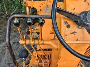 Close-up of yellow motorcycle