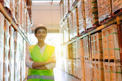 Portrait of traditional working standing on building