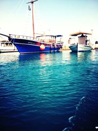 Boats in calm blue sea