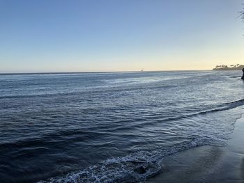 Scenic view of sea against clear blue sky