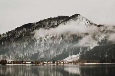 Panoramic view of lake and trees against sky