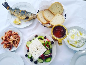 Classic mediterranean lunch with fish and greek salad