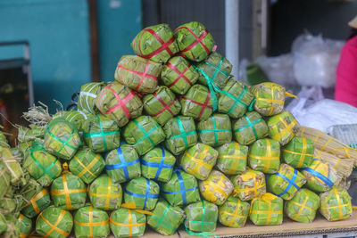 Vietnamese fermented pork roll and cylindrical sticky rice cake are displayed