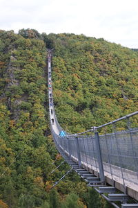 High angle view of dam on mountain against sky