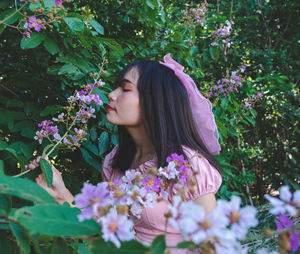 Woman with pink flowers