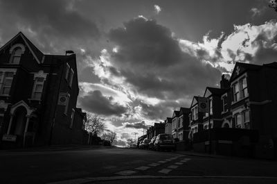 Low angle view of buildings in city against sky
