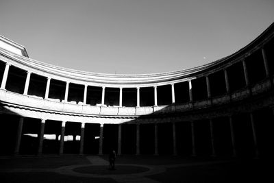 Row of built structure against clear sky