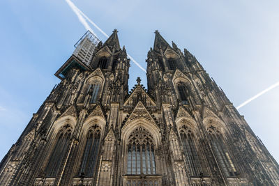 Low angle view of cologne cathedral against sky