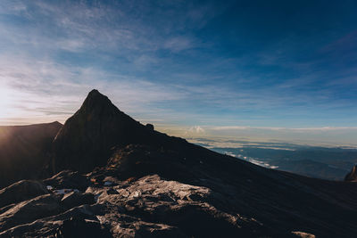 Scenic view of mountain against sky during sunset