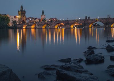 Reflection of illuminated buildings in water