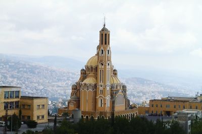 View of church against cloudy sky