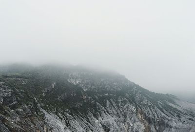 Scenic view of mountains against sky during winter