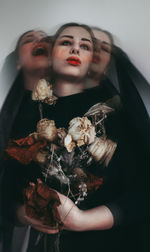 Portrait of young woman looking away
