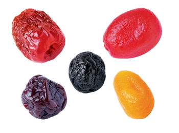 Close-up of oranges against white background