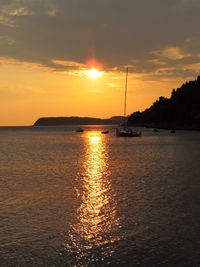 Scenic view of sunset over sea