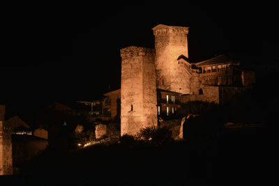 Old building against sky at night