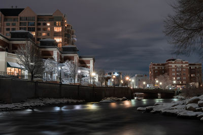 The truckee river flowing though downtown reno, nv on a cold winter night. 