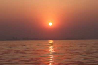 Scenic view of sea against sky during sunset