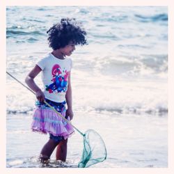 Full length of girl on beach