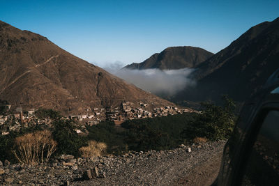 Scenic view of landscape against clear blue sky