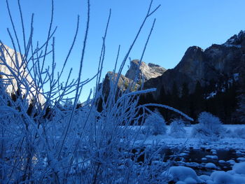 Scenic view of snow covered mountain against sky