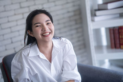 Portrait of a smiling young woman