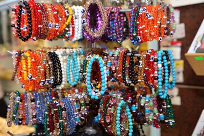 Colorful bracelets for sale at market stall