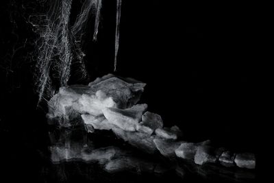 Close-up of ice crystals against black background