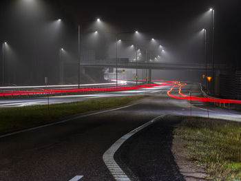 Light trails on road at night