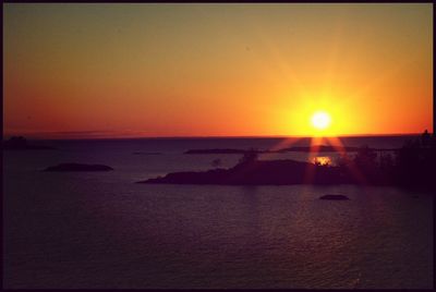 Scenic view of sea at sunset