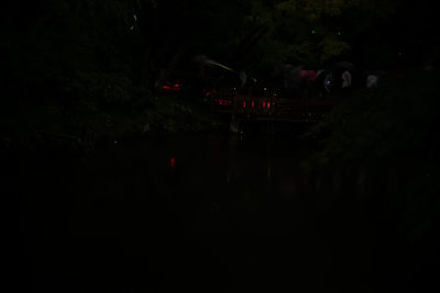 Illuminated road in city at night
