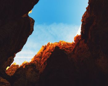 Low angle view of rock formation against sky