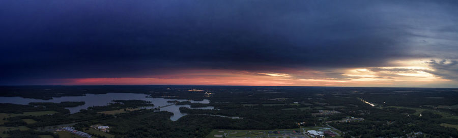 High angle view of buildings against sky during sunset