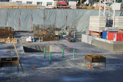 High angle view of construction site by buildings