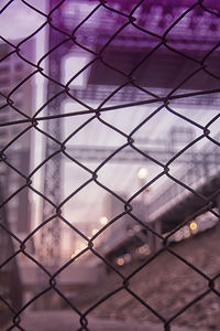 Full frame shot of chainlink fence against sky