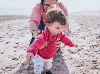 Mother and son on beach