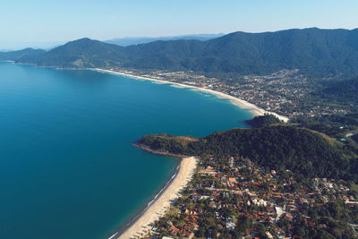 High angle view of bay and sea against sky