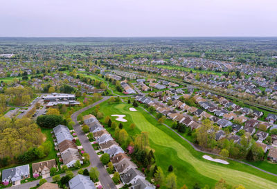 High angle view of road amidst buildings in city